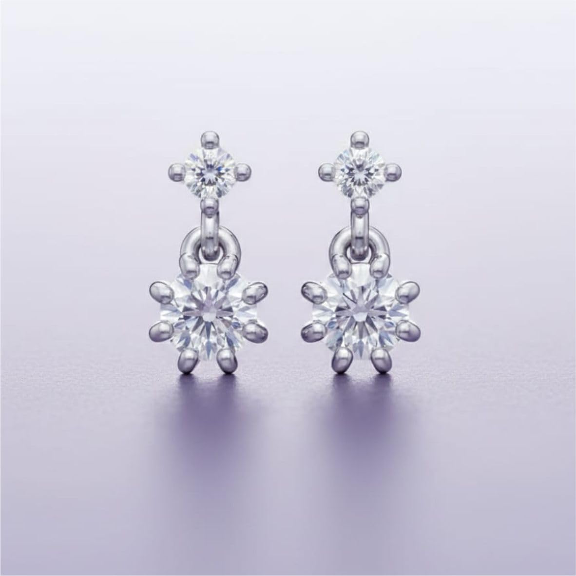 Silver Twin Radiant Drop Earrings