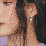 Silver Radiant Curve Drop Earrings
