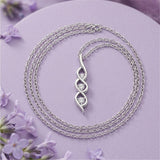 Silver Trinity Spark Wave Pendant