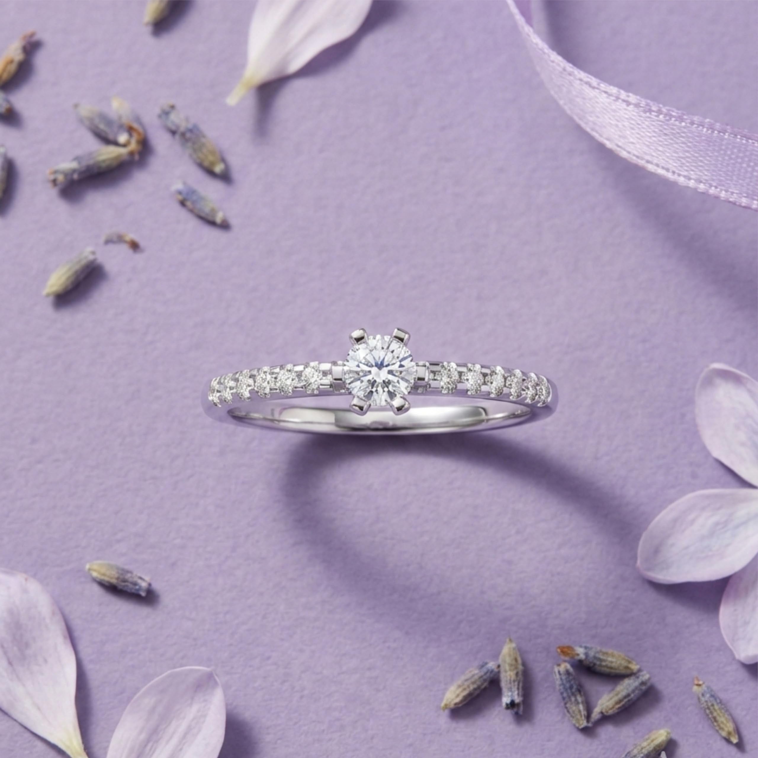 Silver Side-Stone Solitaire Ring
